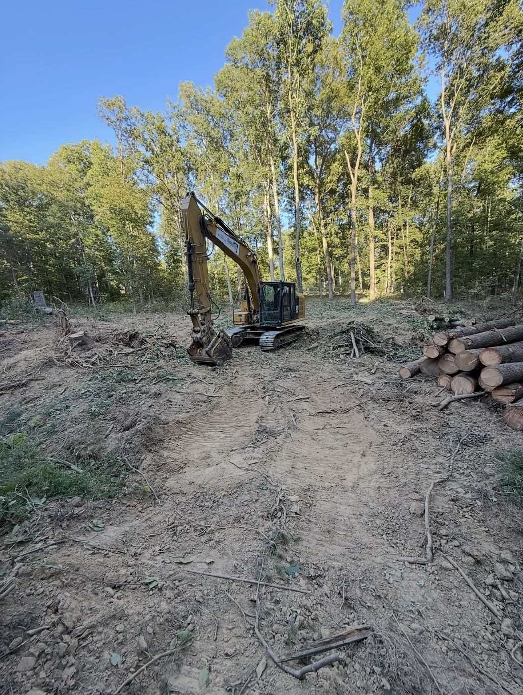 Land clearing with excavator